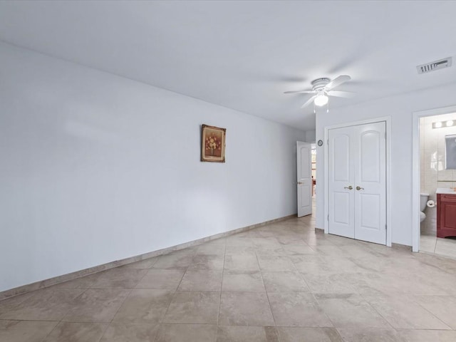 unfurnished room featuring ceiling fan