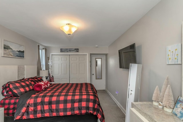 carpeted bedroom featuring a closet