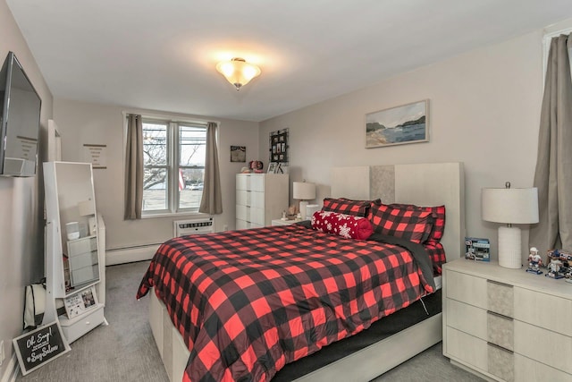 carpeted bedroom featuring a wall mounted AC and a baseboard heating unit