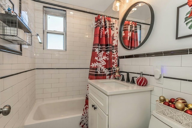 full bathroom featuring vanity, decorative backsplash, toilet, tile walls, and shower / tub combo with curtain