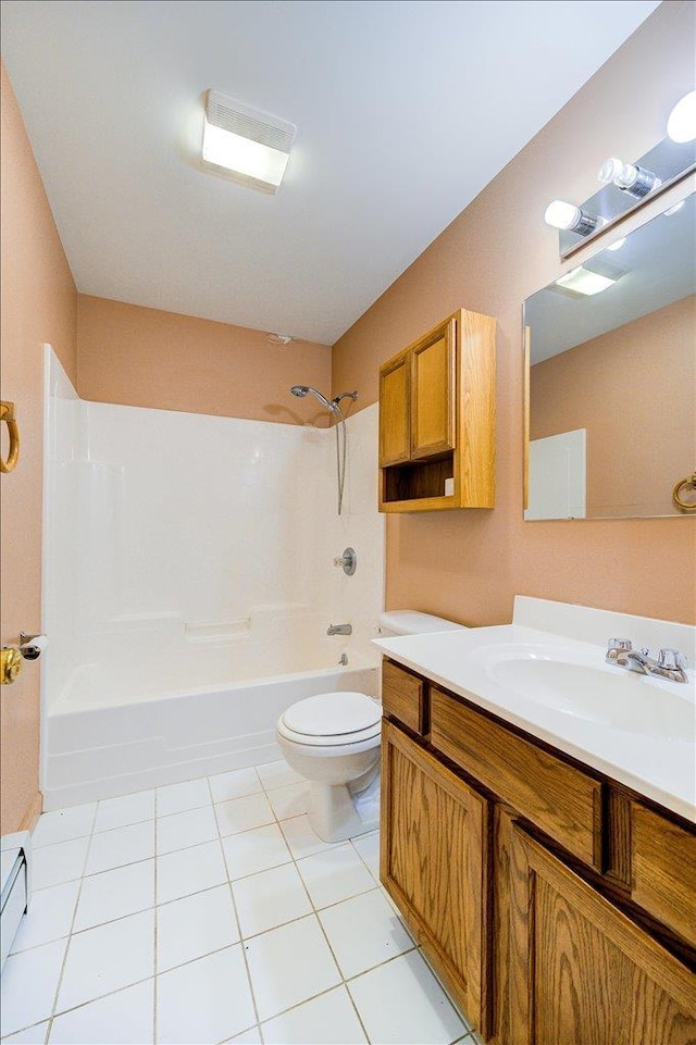 full bathroom featuring tile patterned floors, vanity, toilet, and shower / tub combination