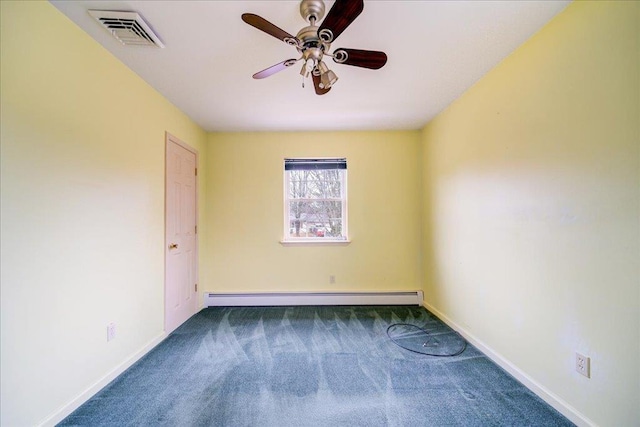 carpeted empty room featuring baseboard heating and ceiling fan