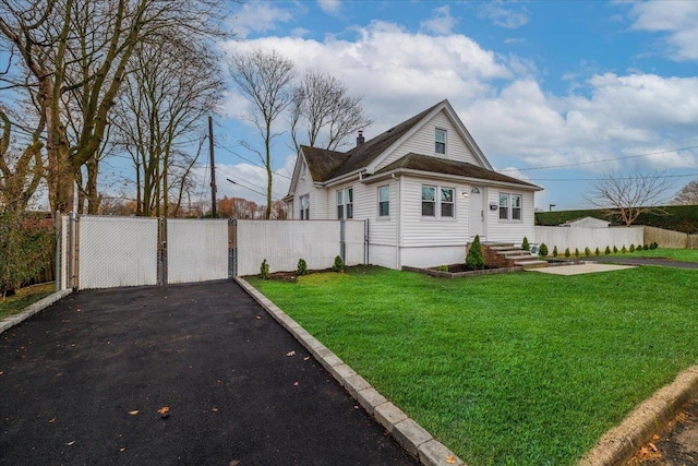 view of property exterior featuring a yard