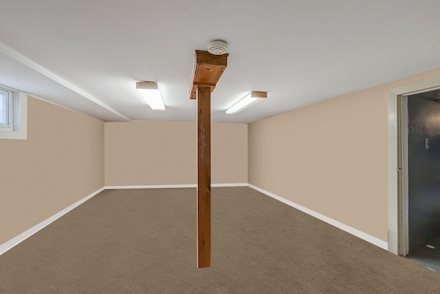 basement with carpet flooring