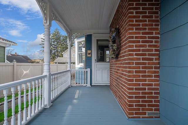 entrance to property with a porch