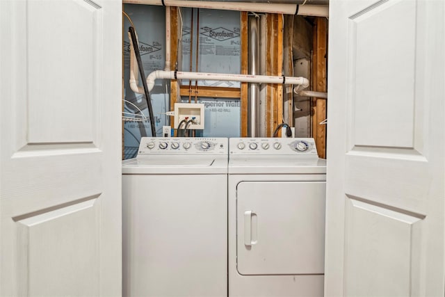 washroom featuring washer and dryer