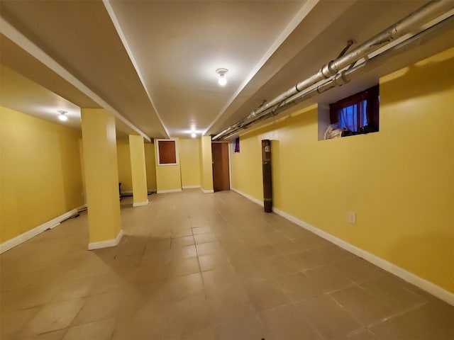 basement with tile patterned flooring