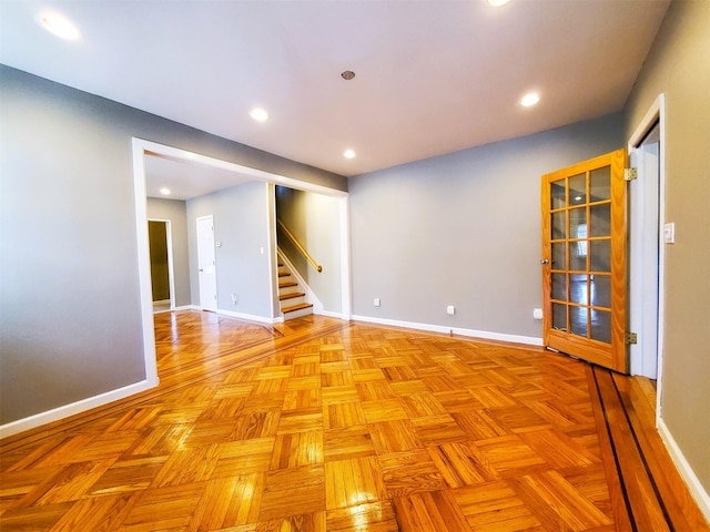 unfurnished room featuring light parquet floors