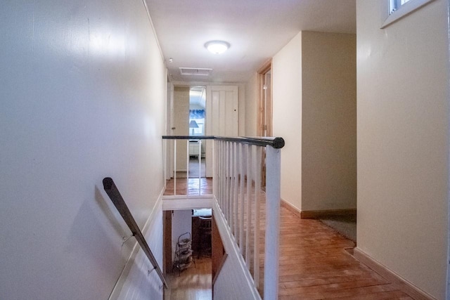 corridor featuring hardwood / wood-style flooring