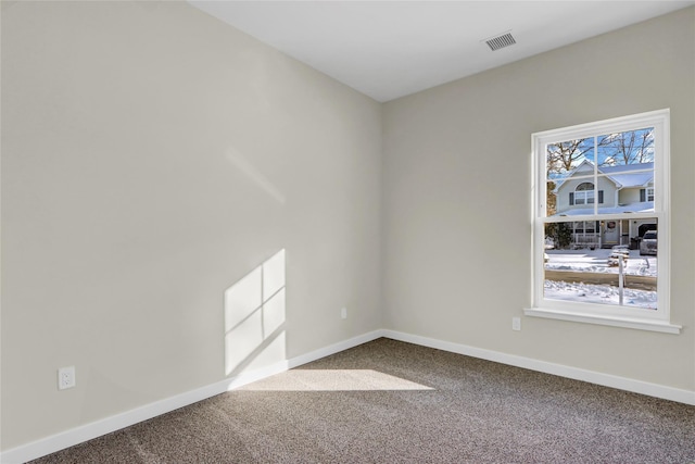 unfurnished room with carpet flooring