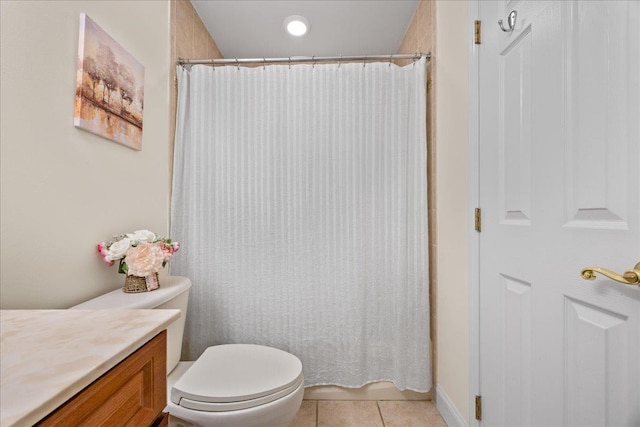 bathroom with tile patterned flooring, vanity, toilet, and a shower with shower curtain