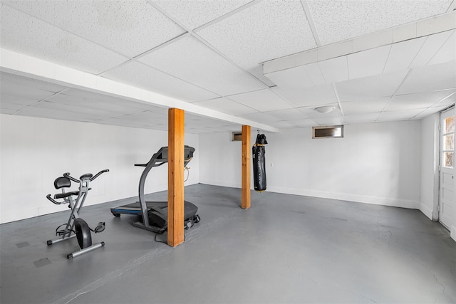 exercise room with a drop ceiling