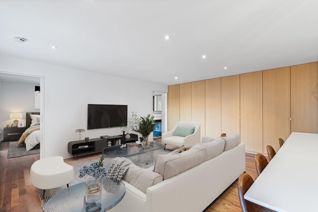 living room with light hardwood / wood-style flooring