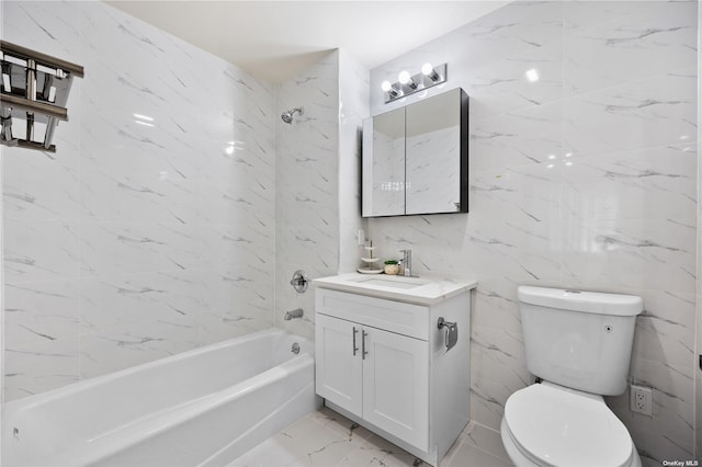 full bathroom featuring vanity, toilet, tile walls, and tiled shower / bath