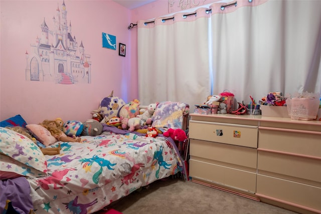 bedroom featuring carpet