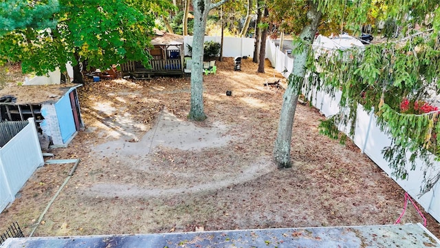 view of yard with a wooden deck