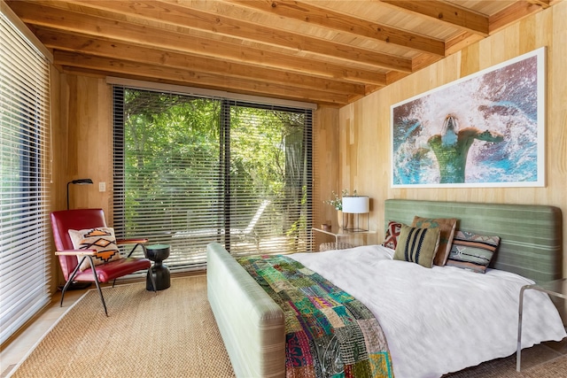 bedroom featuring wood walls, wood ceiling, and beam ceiling