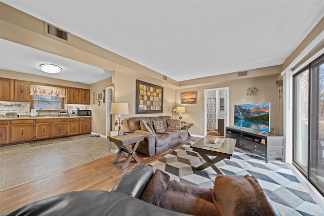 living room with light wood-type flooring