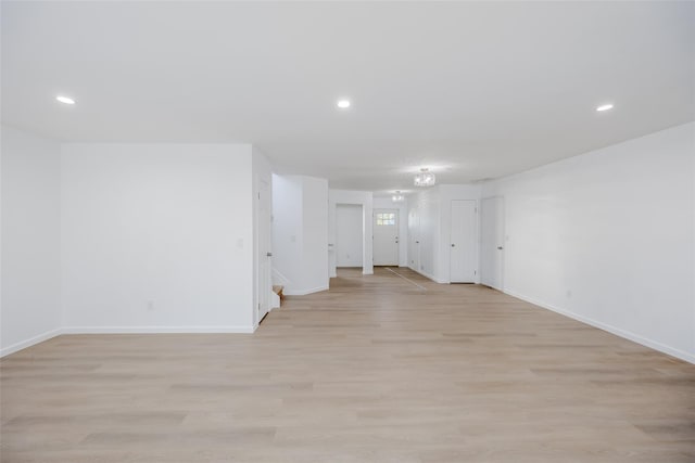 spare room with light wood-type flooring