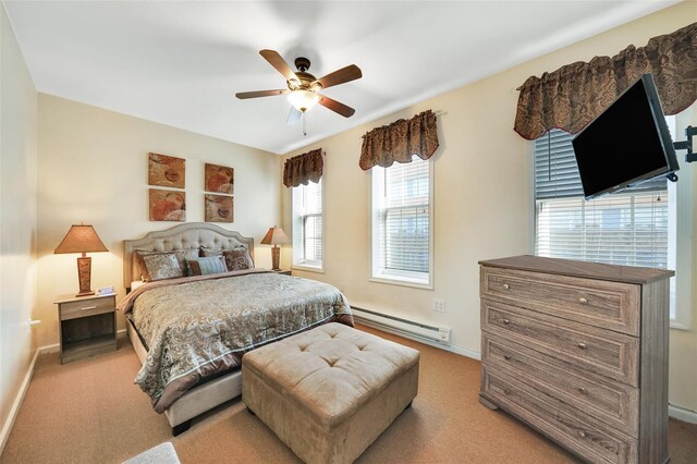 bedroom featuring baseboard heating, ceiling fan, and light carpet