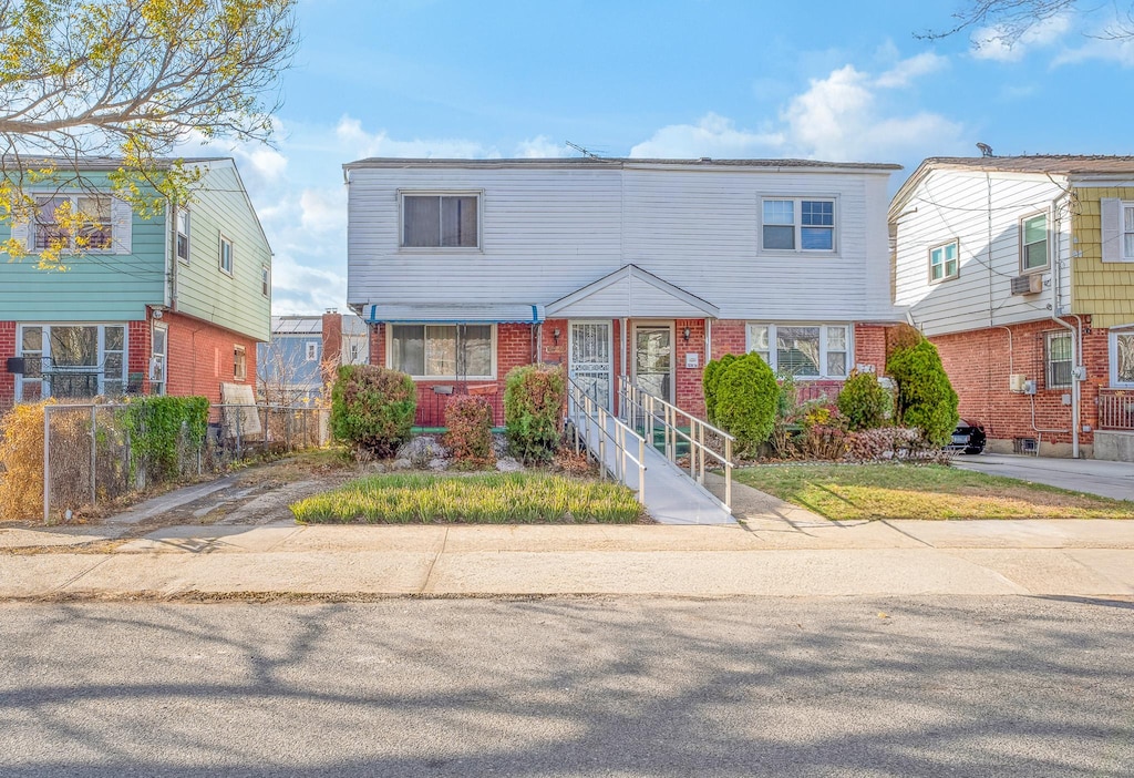 view of front of property with cooling unit