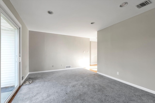 empty room with carpet flooring