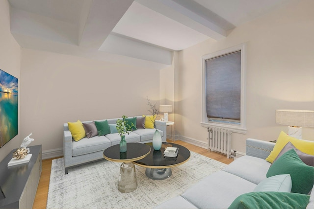 living room with beam ceiling, radiator, and hardwood / wood-style floors