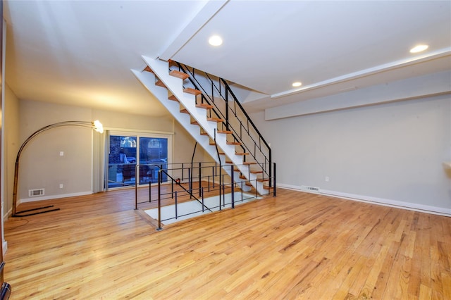 unfurnished living room featuring light hardwood / wood-style flooring