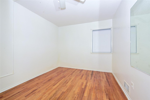 unfurnished room featuring ceiling fan and light hardwood / wood-style flooring