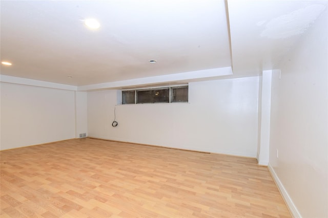 basement with light wood-type flooring