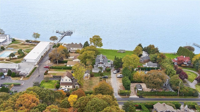 bird's eye view featuring a residential view and a water view