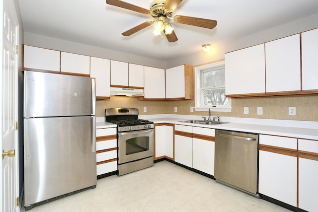 kitchen with white cabinets, ceiling fan, sink, and appliances with stainless steel finishes