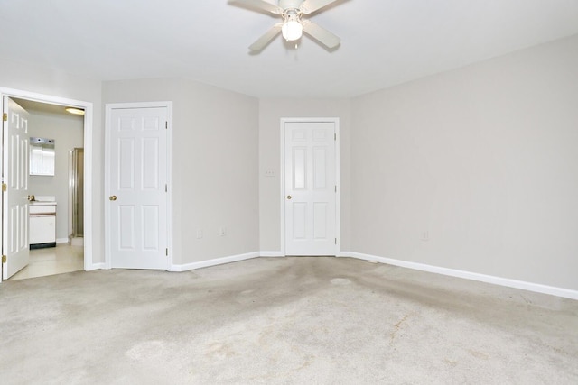 unfurnished room with light carpet and ceiling fan