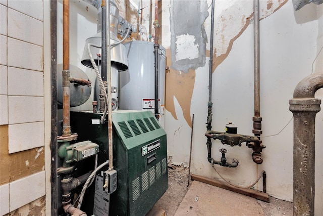 utility room featuring water heater