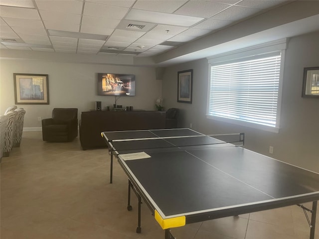 game room featuring a paneled ceiling and visible vents