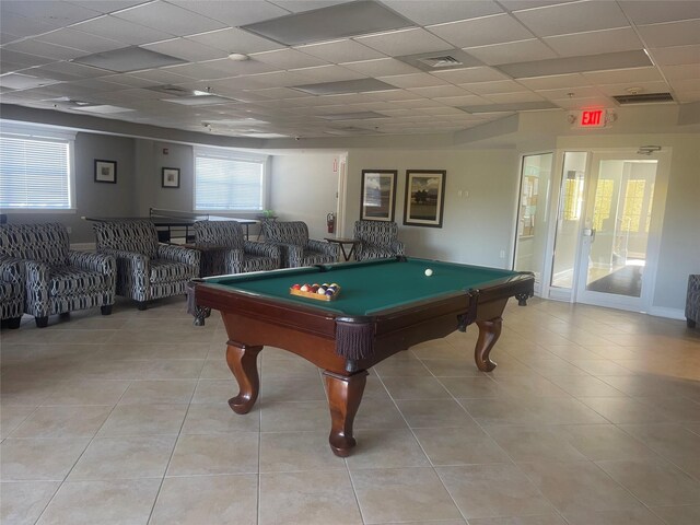 game room with visible vents, pool table, light tile patterned floors, and a paneled ceiling