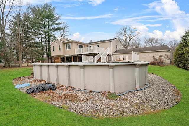 exterior space featuring a yard and a wooden deck