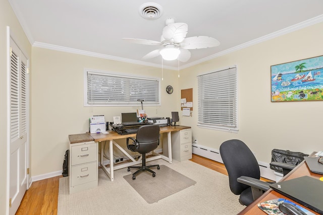 office space with a baseboard heating unit, crown molding, ceiling fan, and light wood-type flooring