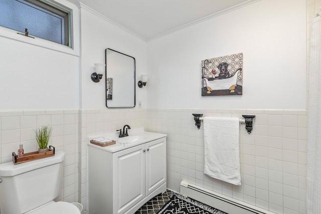 bathroom featuring toilet, crown molding, tile walls, a baseboard radiator, and vanity