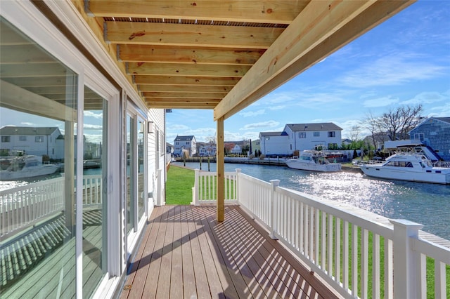 balcony featuring a water view