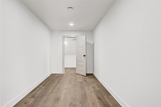 corridor featuring light wood-type flooring