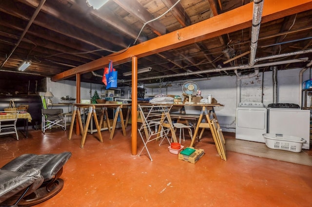 basement with washing machine and dryer