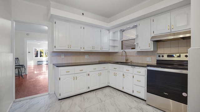 kitchen with electric range, sink, tasteful backsplash, white cabinets, and ornamental molding