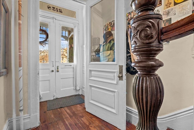 entrance foyer with dark hardwood / wood-style flooring