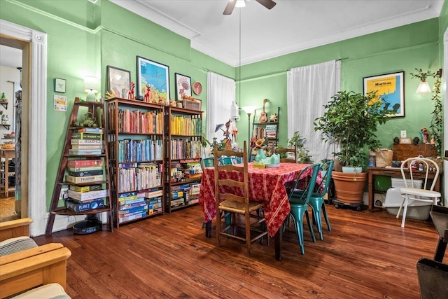 dining room featuring ceiling fan, dark hardwood / wood-style flooring, and crown molding