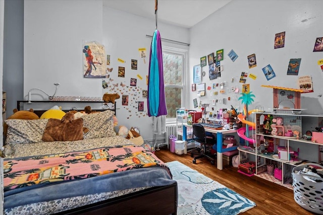 bedroom featuring dark hardwood / wood-style floors