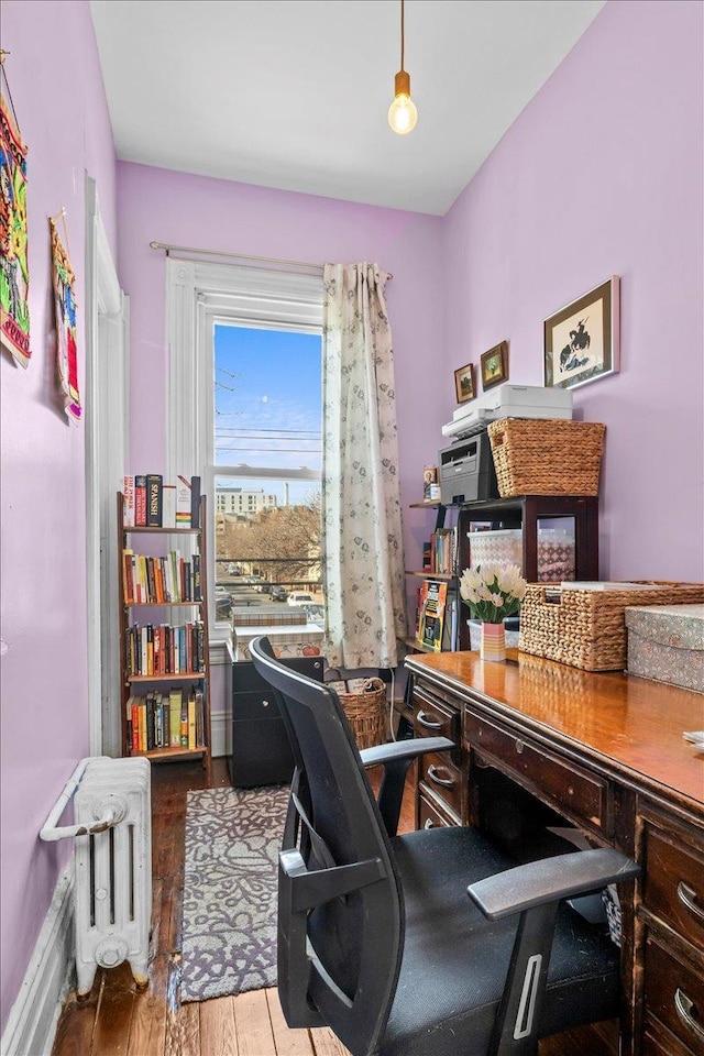 office area with hardwood / wood-style flooring