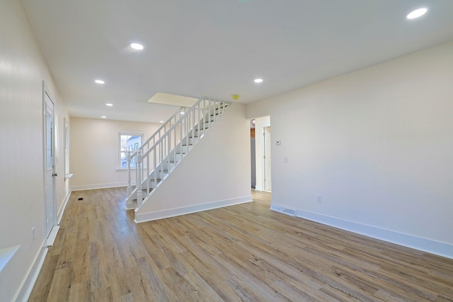 unfurnished room featuring light wood-type flooring