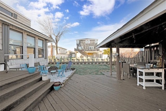 deck with an outdoor fire pit