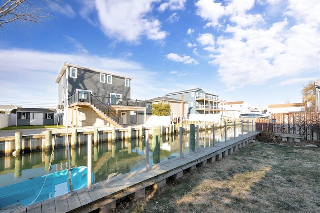 view of dock featuring a deck with water view